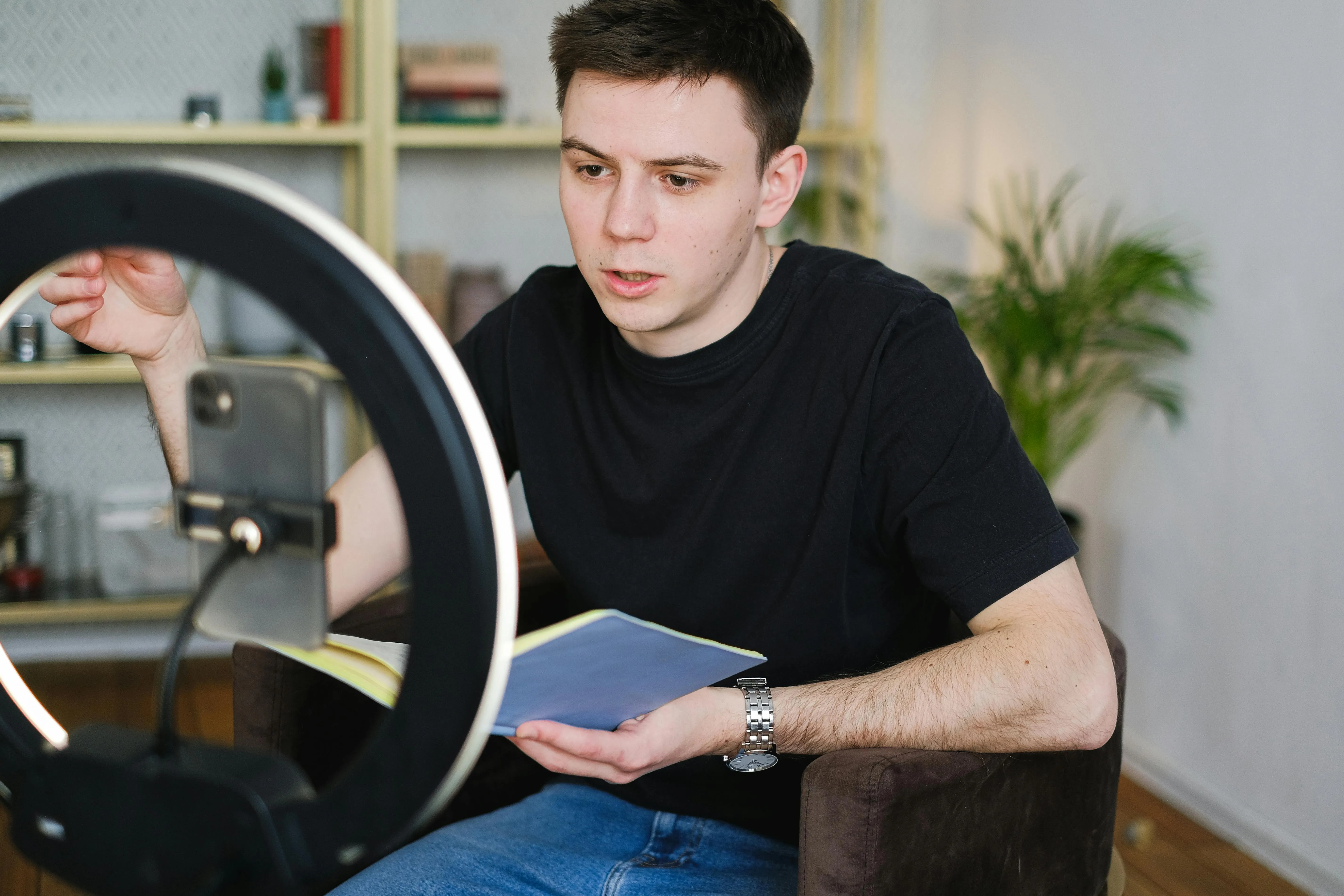 A content creator filming a Reel with a ring light for a Miami brand